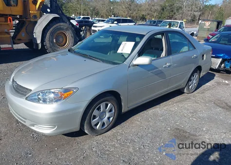 2002 Toyota Camry Le z USA, uszkodzony, nr VIN 4T1BE32KX2U117098